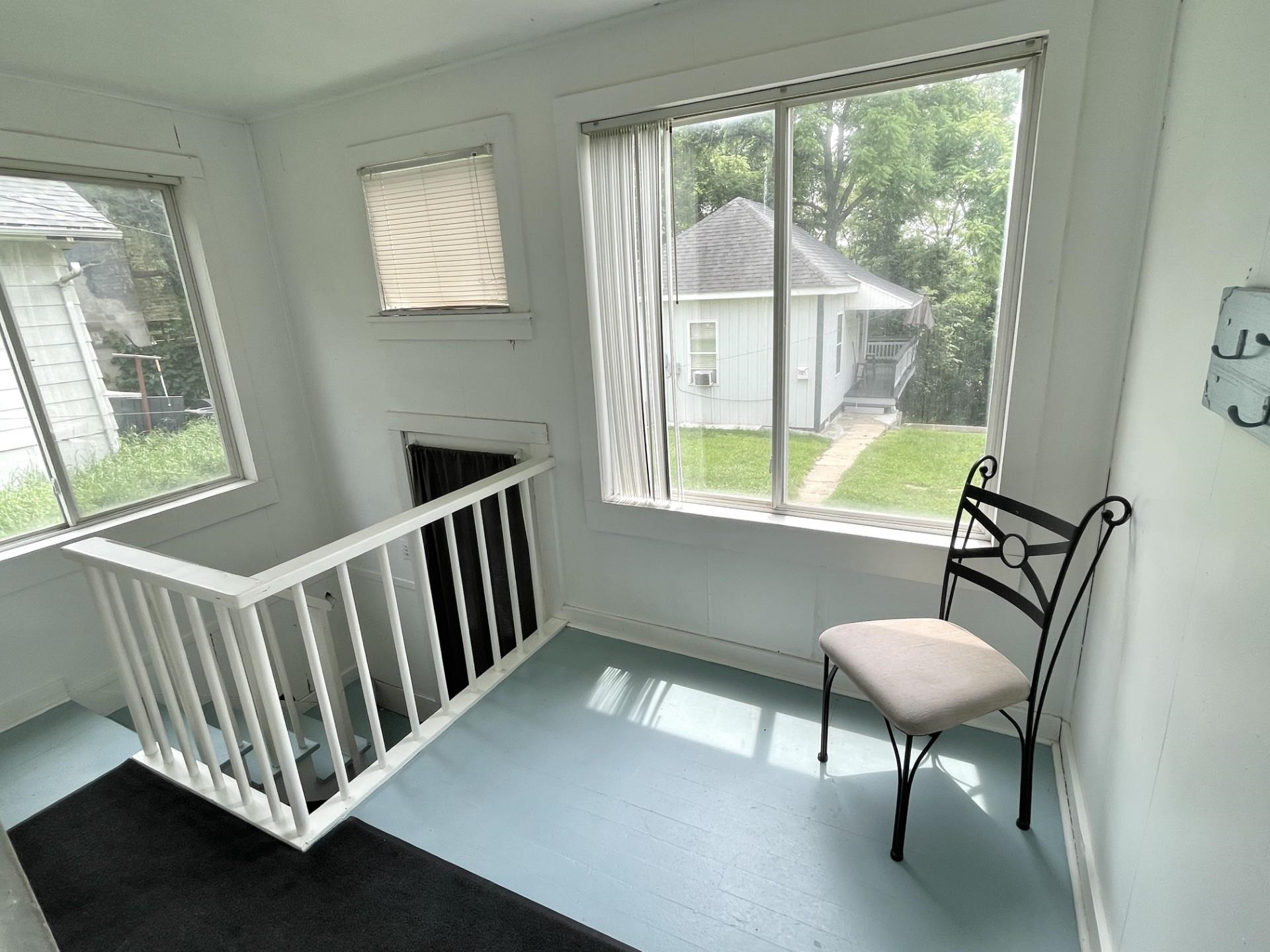 42 2nd Street LaSalle, IL 61301 - Photo 7 of 22 a view of a room with furniture a chandelier and windows