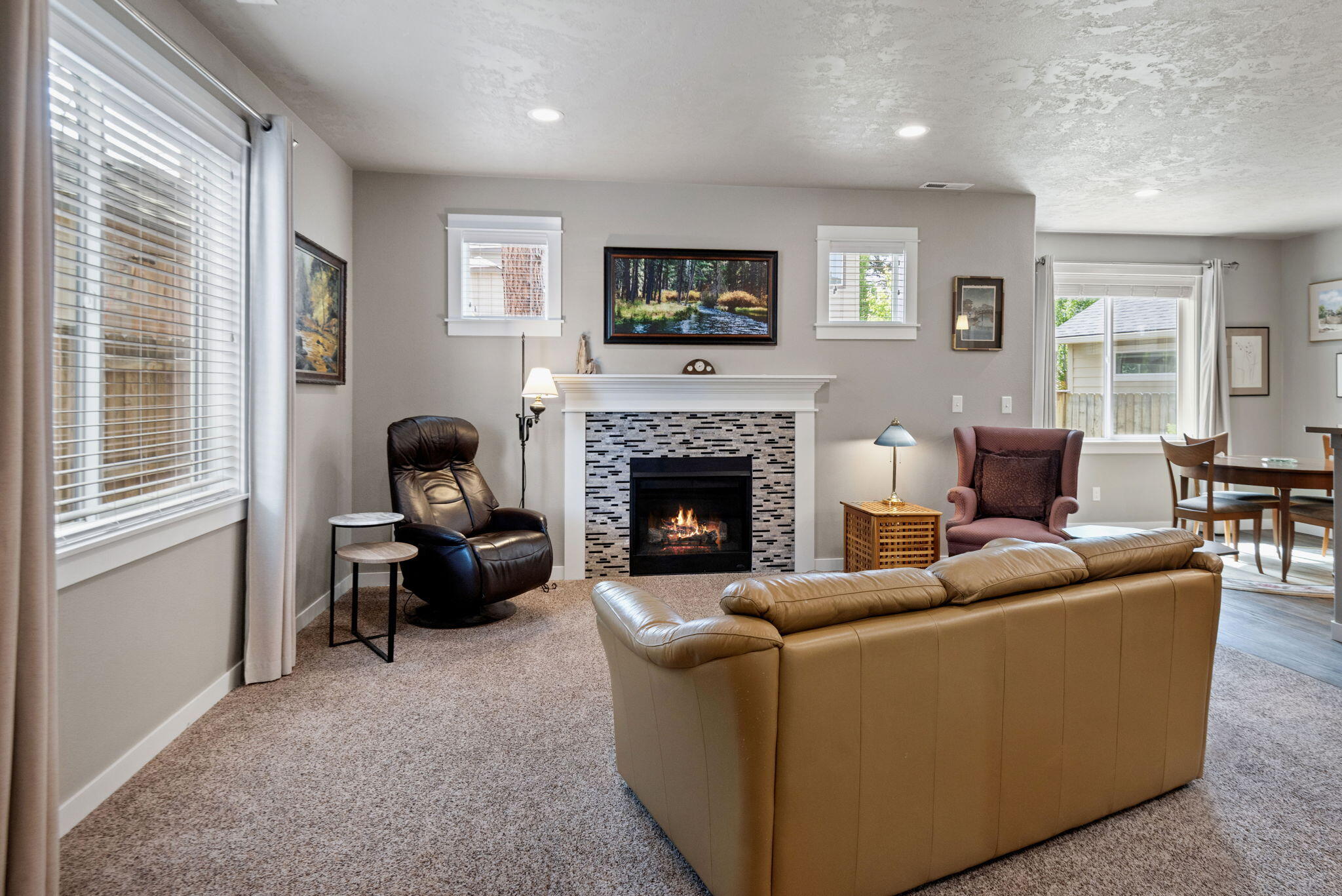 715 Brooks Camp Road Sisters, OR 97759 - Photo 5 of 25 a living room with furniture and a fireplace