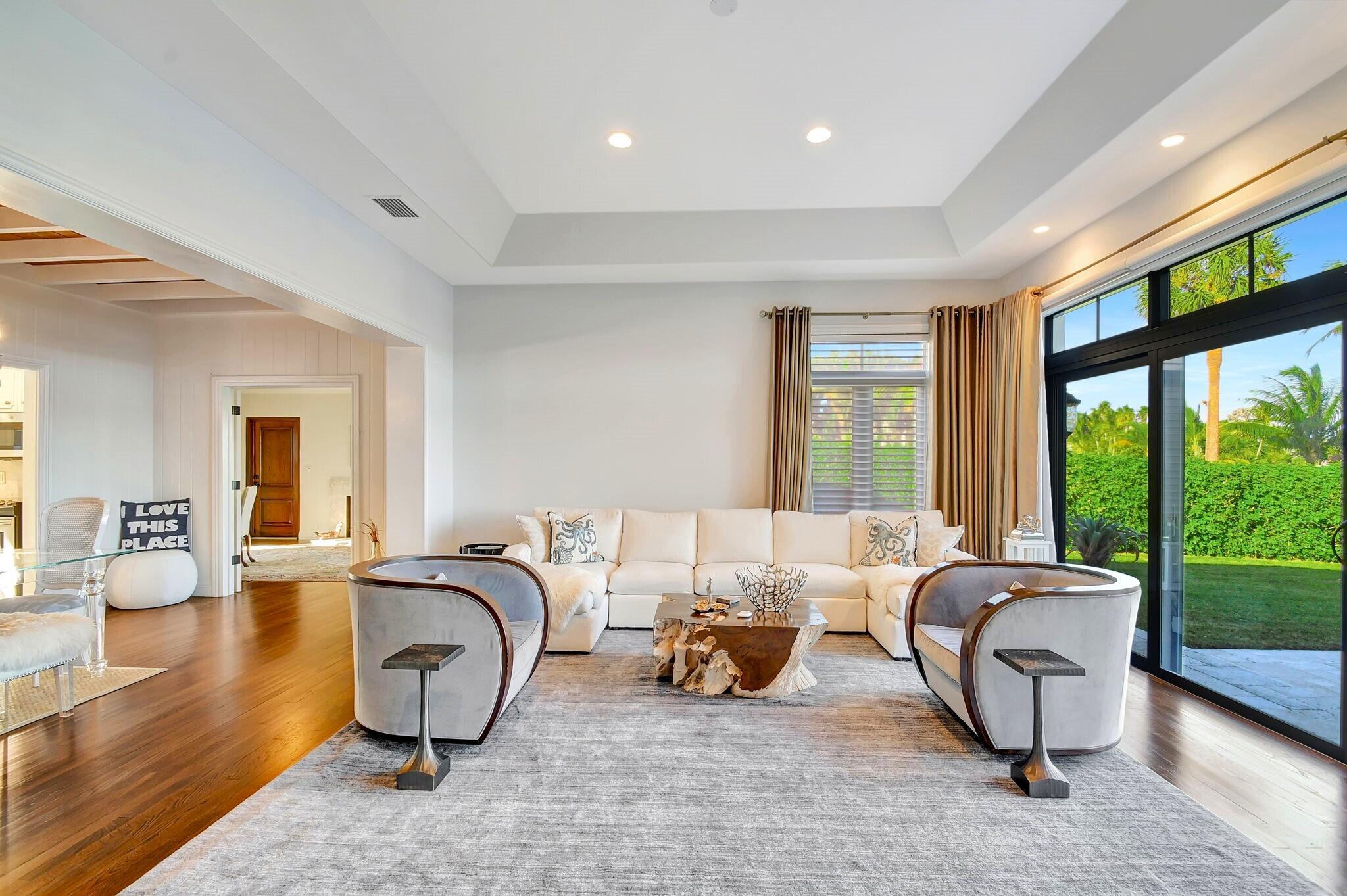 310 South Lake Drive Lantana, FL 33462 - Photo 21 of 65 a living room with furniture and large windows