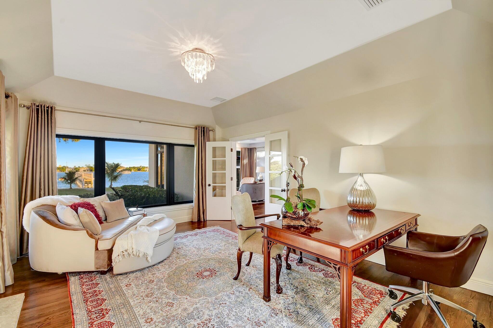 310 South Lake Drive Lantana, FL 33462 - Photo 28 of 65 a living room with furniture and wooden floor