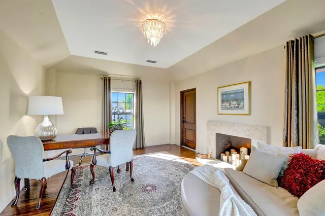 a large bedroom with a large bed and a large window