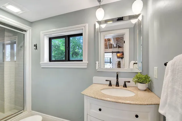 a kitchen with stainless steel appliances granite countertop a sink and cabinets