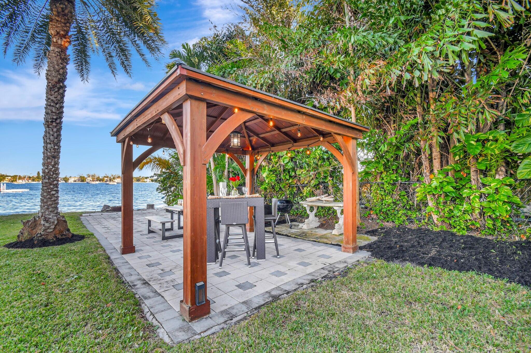 310 South Lake Drive Lantana, FL 33462 - Photo 43 of 65 a view of outdoor space yard deck and patio