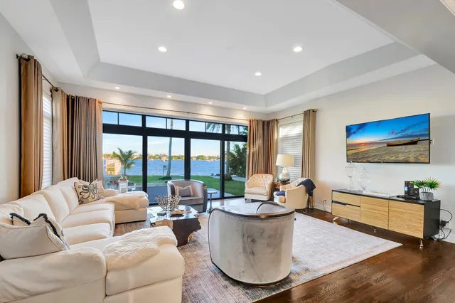 a view of a house with a small yard and plants