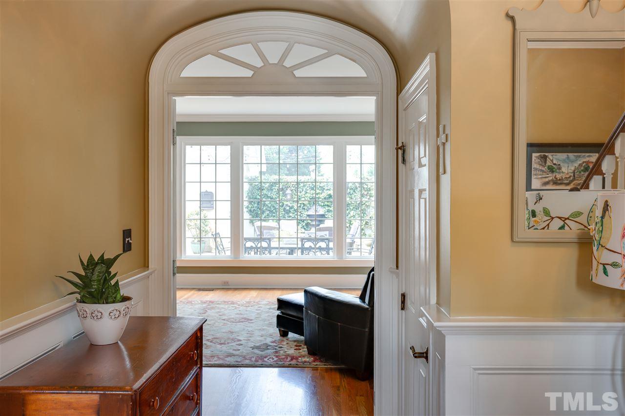 1005 Oak Creek Road Raleigh, NC 27615 - Photo 3 of 30 a living room with furniture and a large window