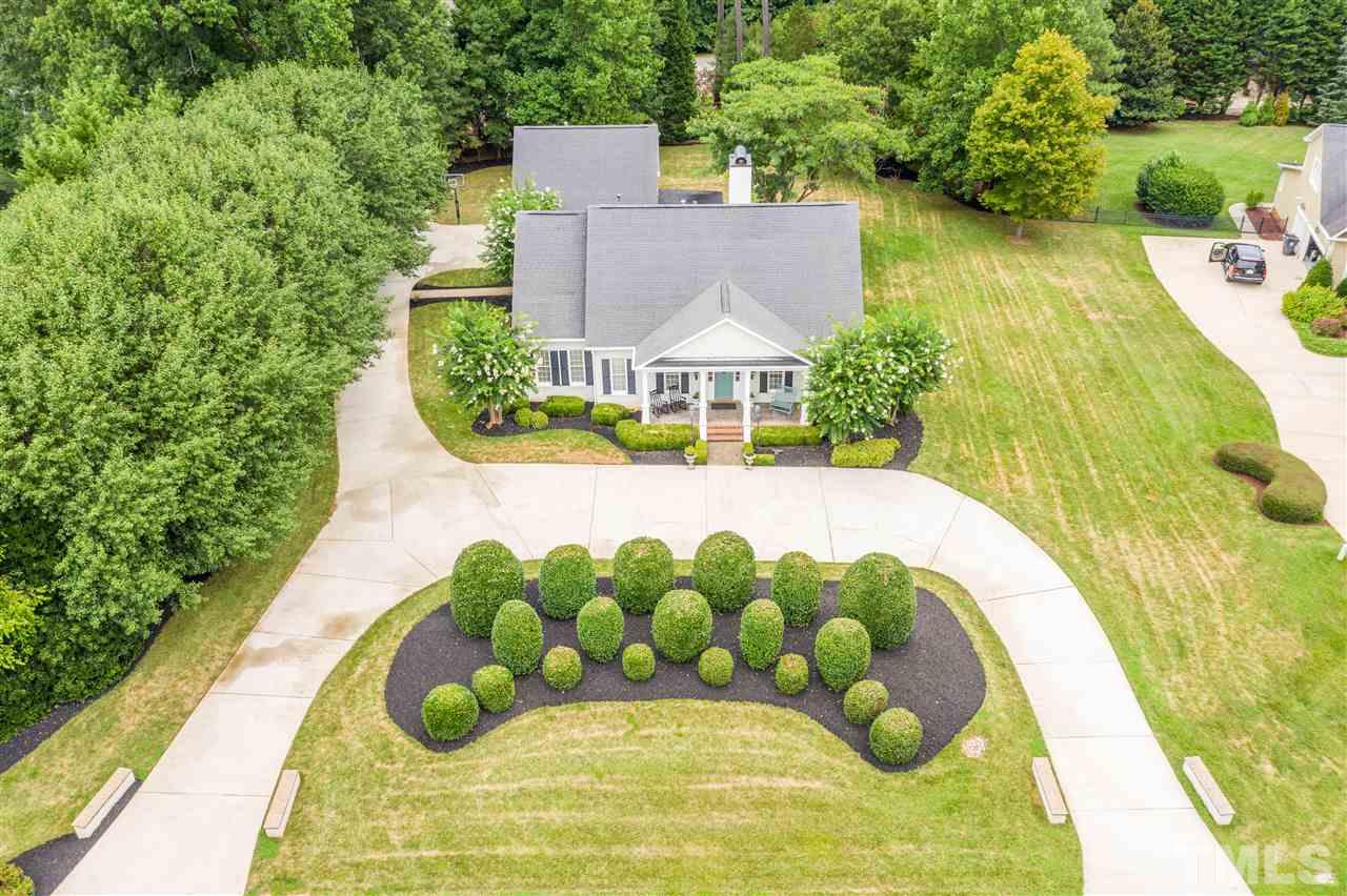 1005 Oak Creek Road Raleigh, NC 27615 - Photo 30 of 30 a view of a swimming pool with some potted plants