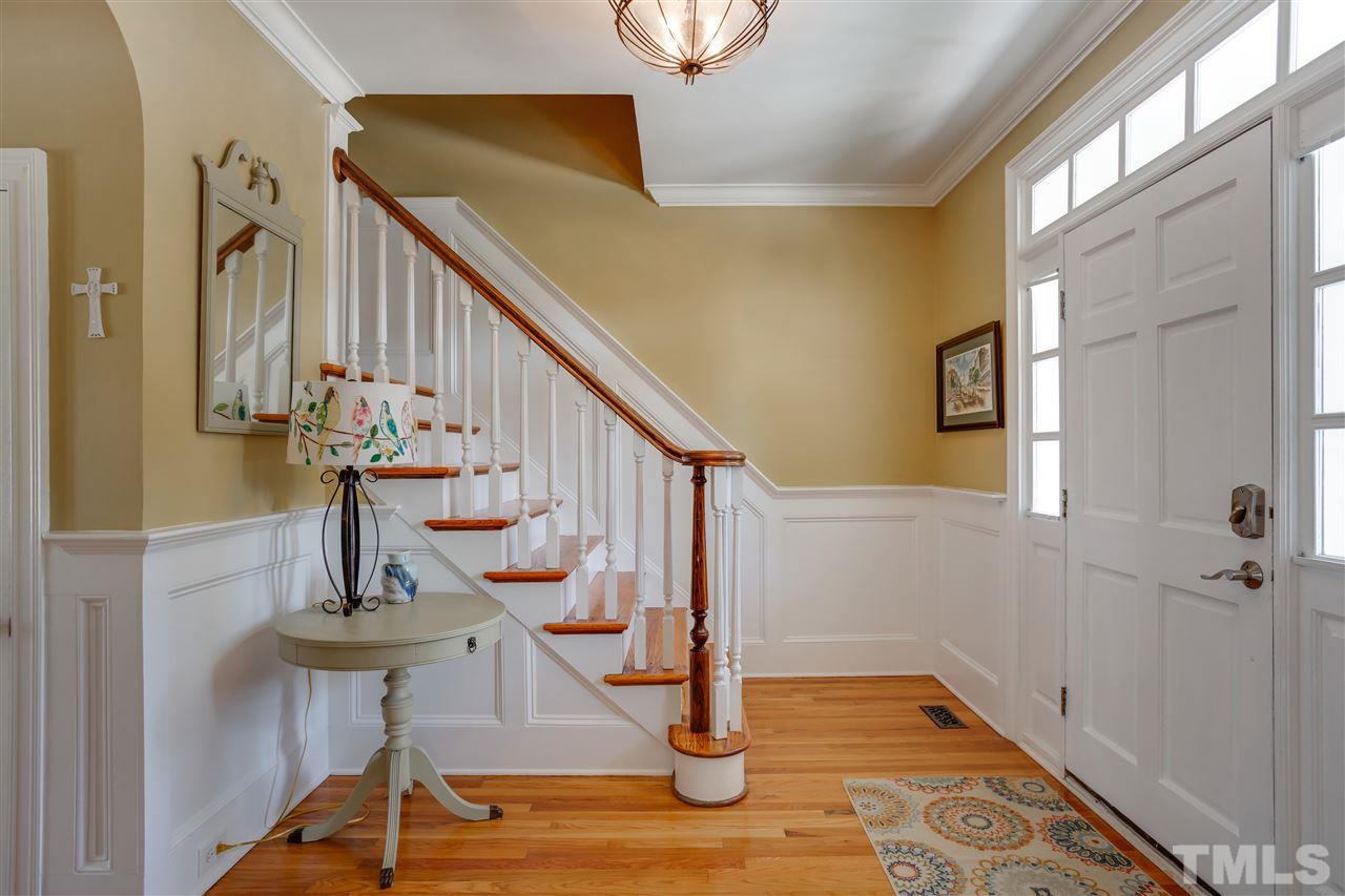 1005 Oak Creek Road Raleigh, NC 27615 - Photo 4 of 30 a view of entryway with wooden floor