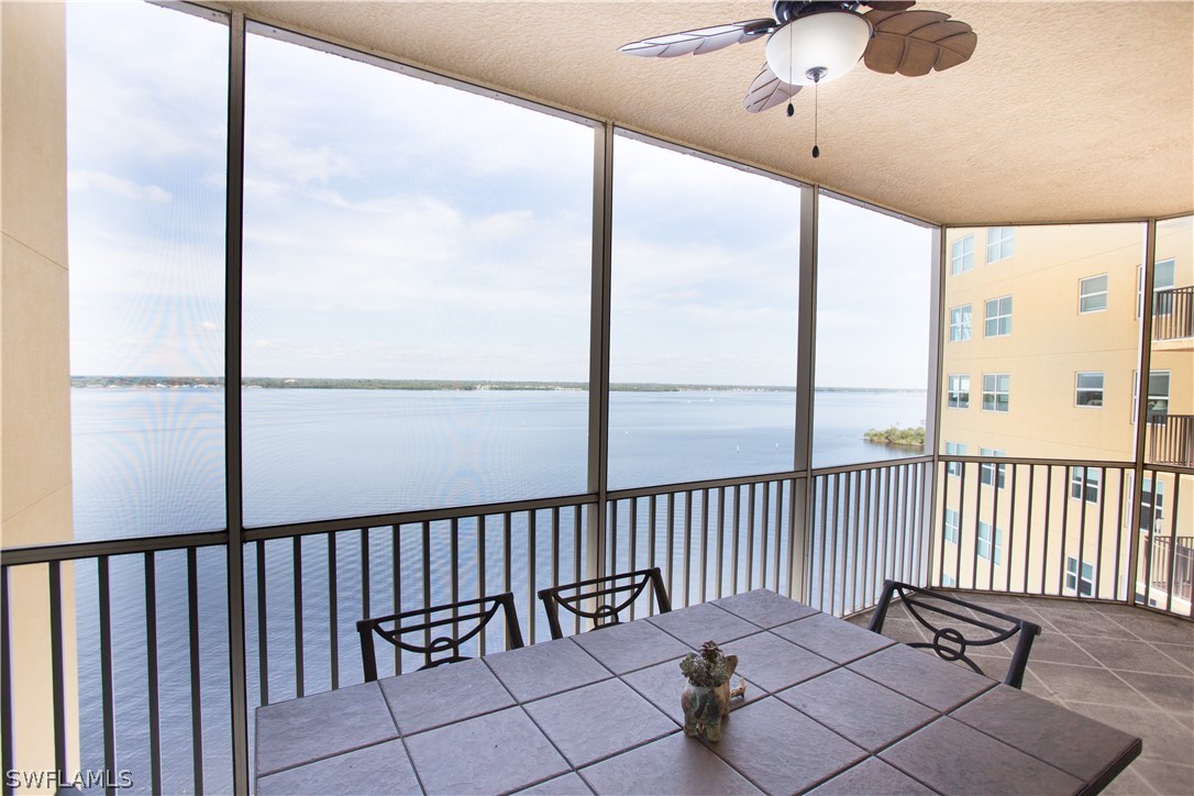 2745 First Street, Unit 1306 Fort Myers, FL 33916 - Photo 23 of 34 a balcony with wooden floor
