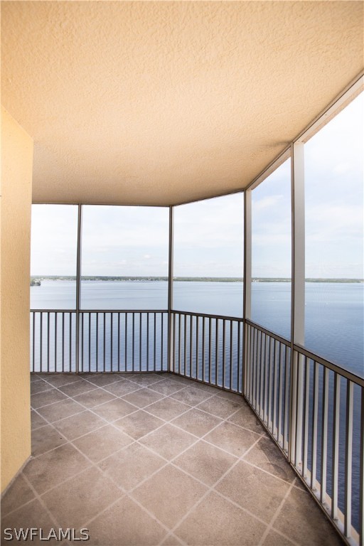 2745 First Street, Unit 1306 Fort Myers, FL 33916 - Photo 25 of 34 a view of a balcony with floor to ceiling window and stairs
