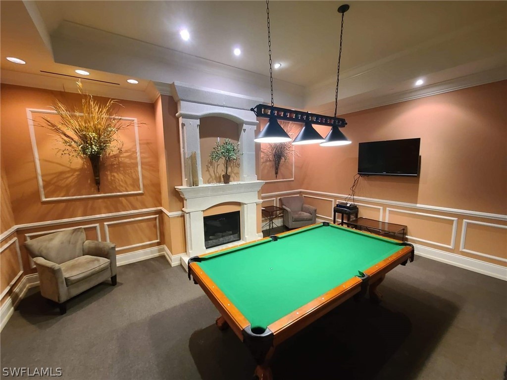 2745 First Street, Unit 1306 Fort Myers, FL 33916 - Photo 28 of 34 a room with pool table and windows