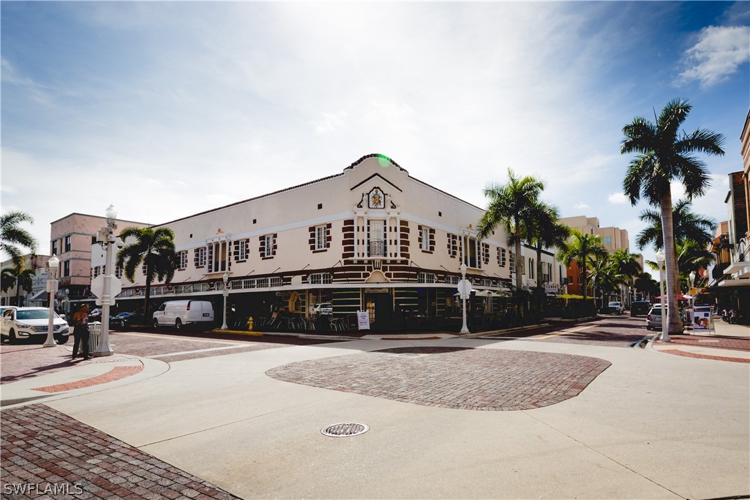 2745 First Street, Unit 1306 Fort Myers, FL 33916 - Photo 31 of 34 a front view of a building with street