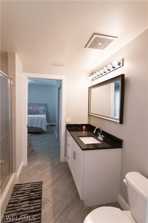 2745 First Street, Unit 1306 Fort Myers, FL 33916 - Photo 8 of 34 a bathroom with a sink and a mirror