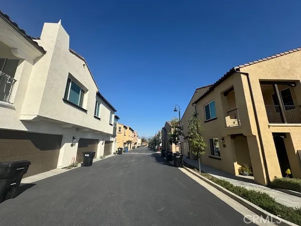 a view of a street with cars