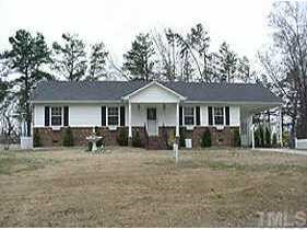 3007 Edgestone Drive Raleigh, NC 27604 - Photo 1 of 1 a front view of a house with a yard