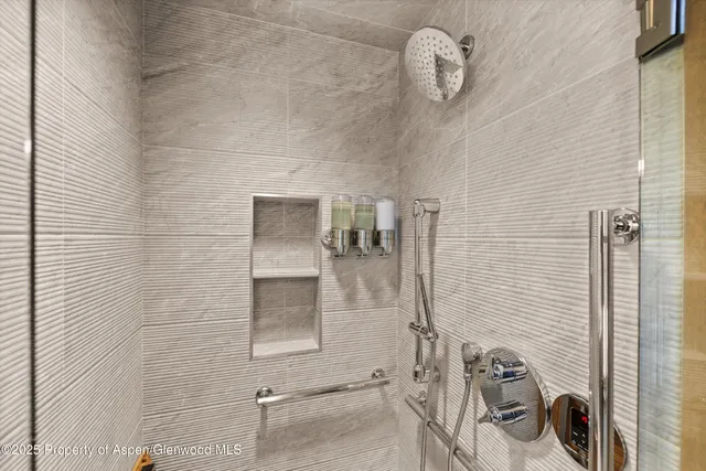 a bathroom with a sink a vanity and a mirror