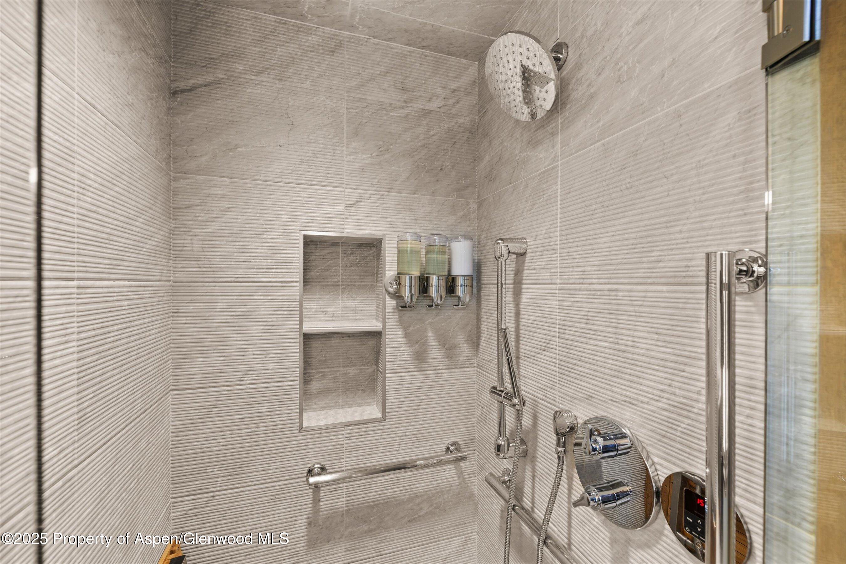 122 West Main Street Aspen, CO 81611 - Photo 18 of 58 a bathroom with a shower