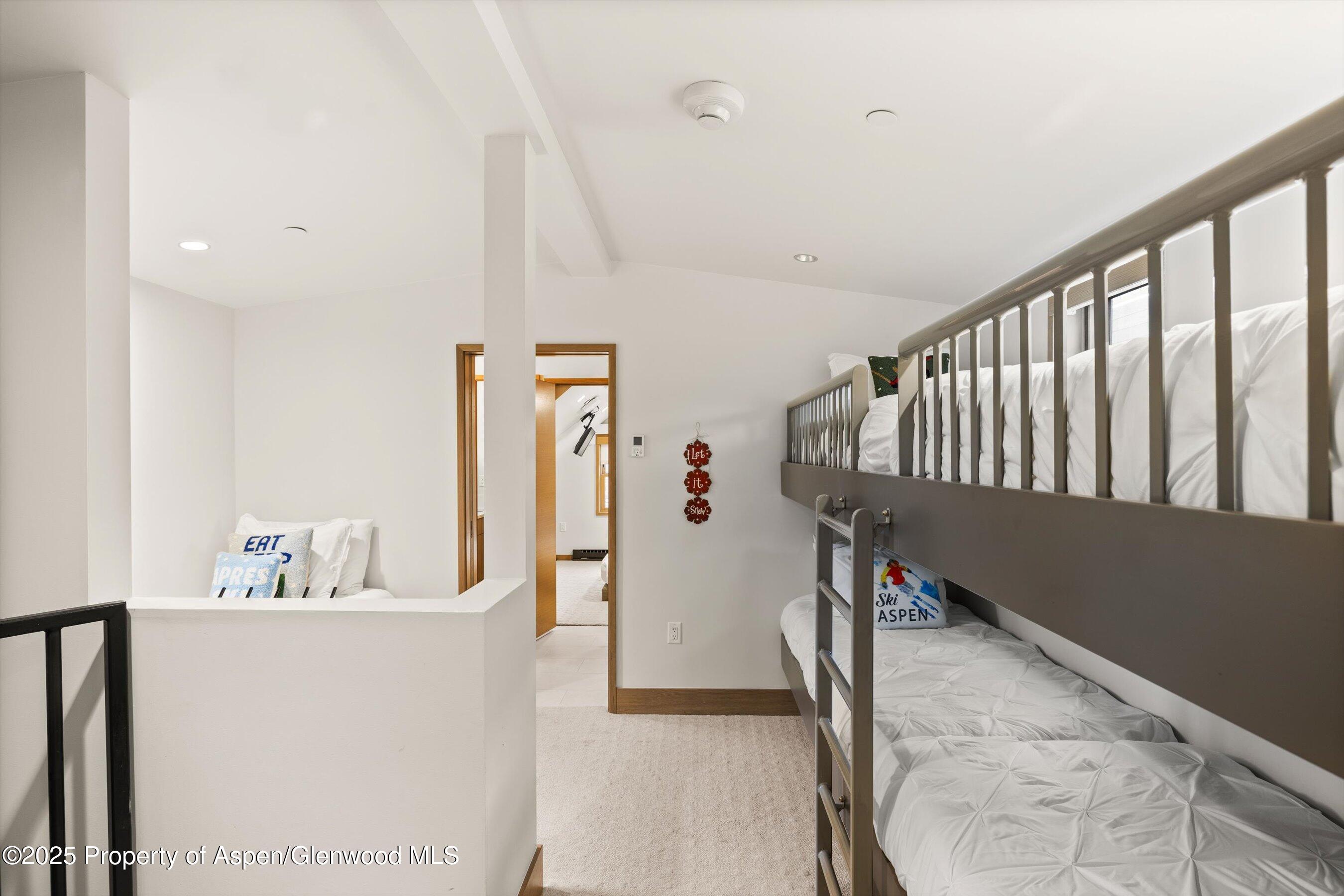 122 West Main Street Aspen, CO 81611 - Photo 24 of 58 a view of a hallway with furniture and entryway