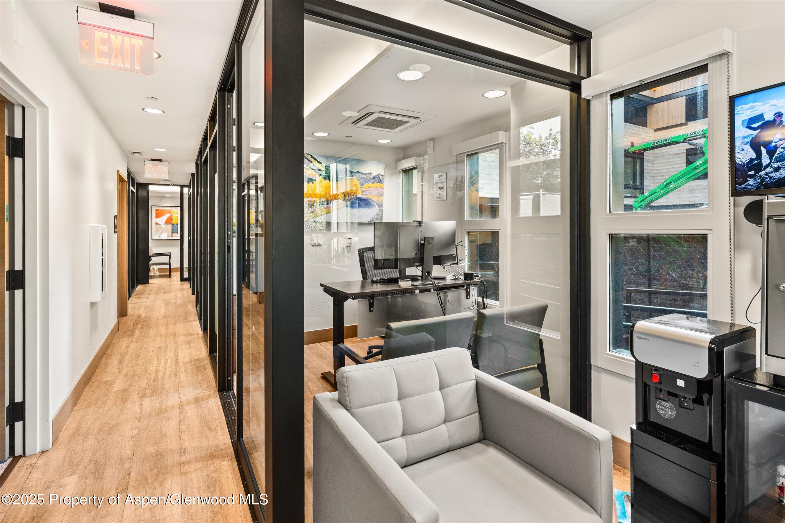 122 West Main Street Aspen, CO 81611 - Photo 33 of 58 a view of living room kitchen and dining room