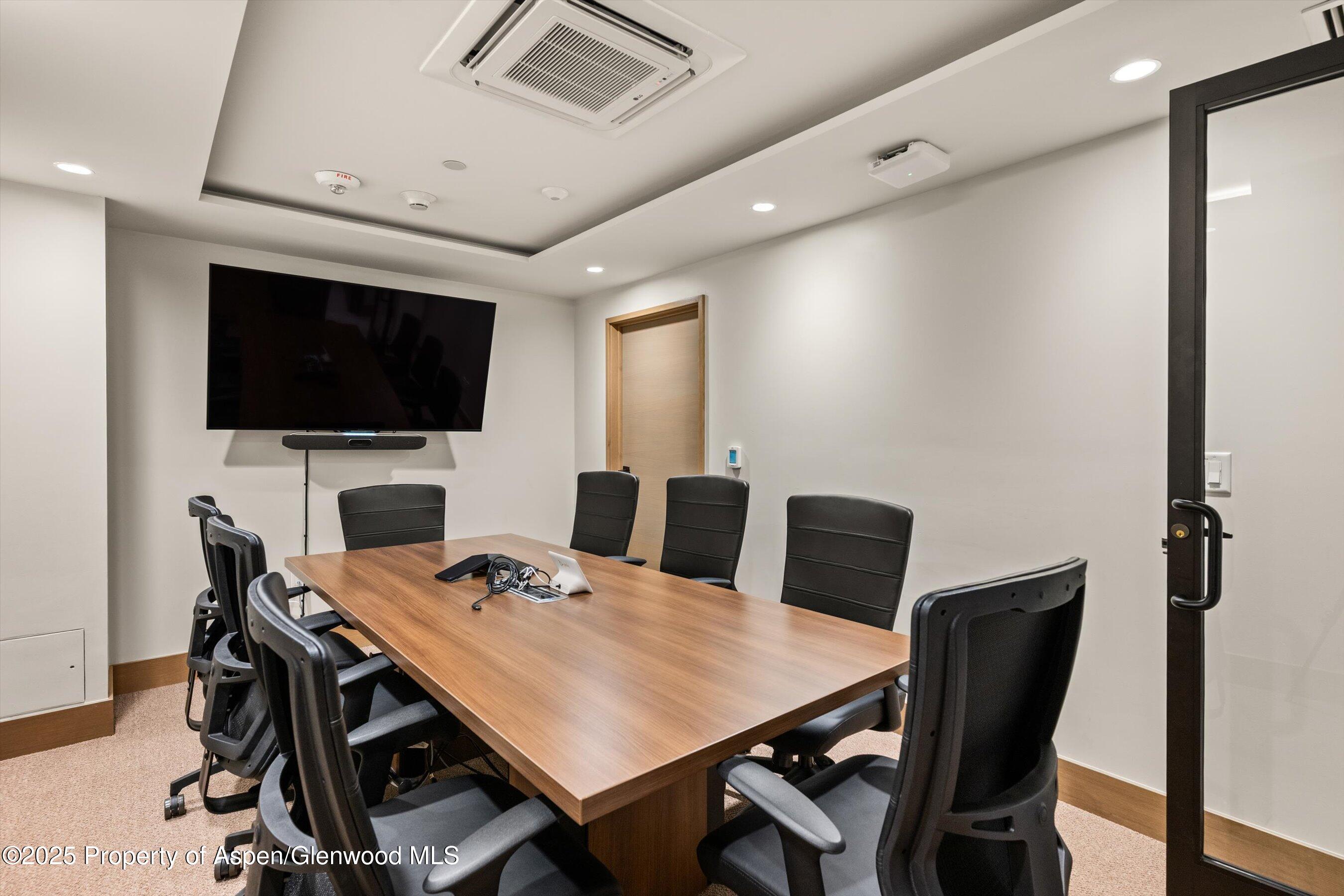 122 West Main Street Aspen, CO 81611 - Photo 52 of 58 a view of a dining room with furniture