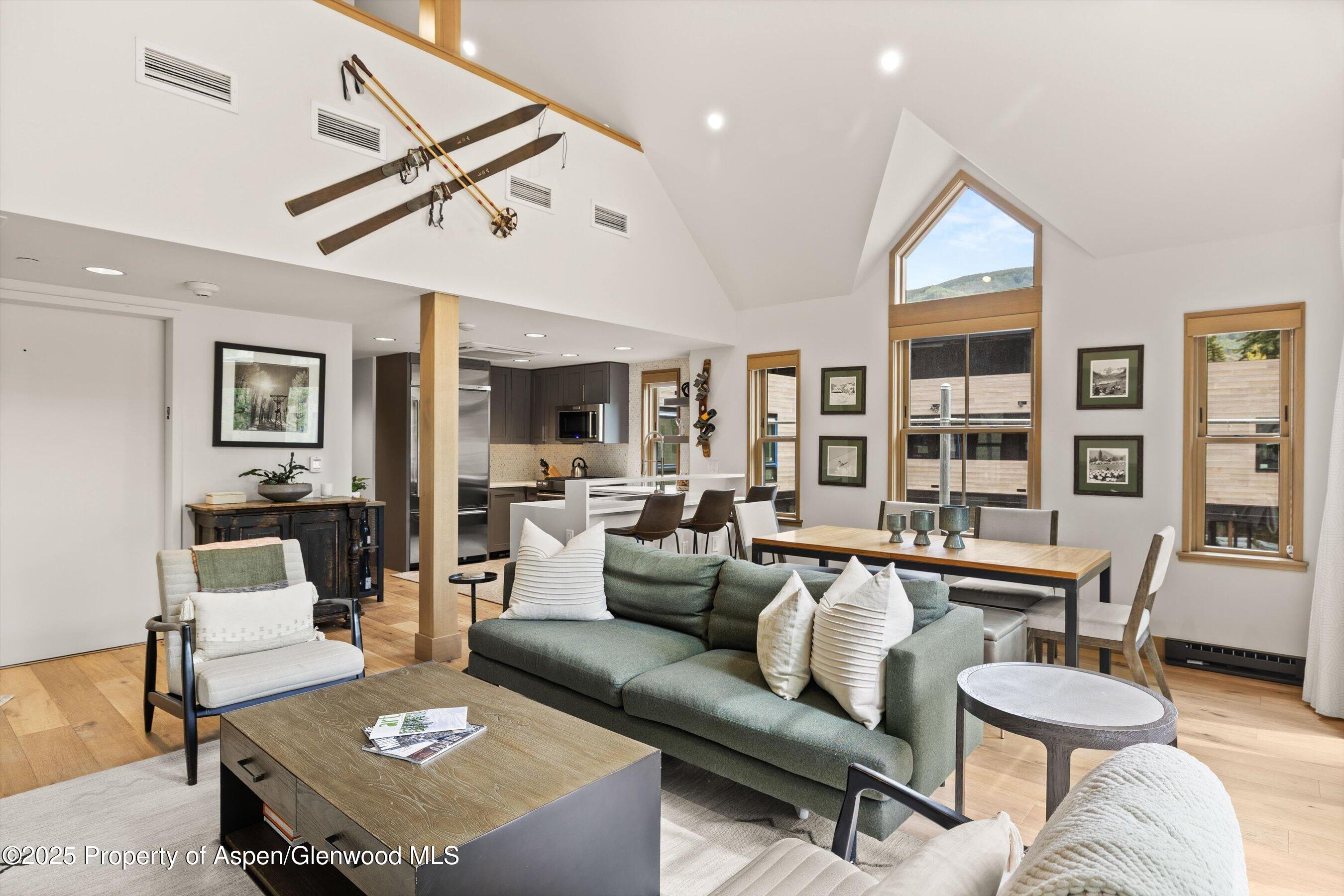 122 West Main Street Aspen, CO 81611 - Photo 7 of 58 a living room with furniture and a table