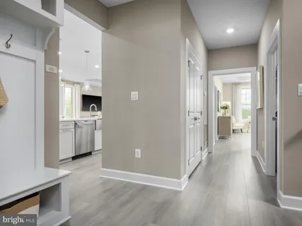 a view of a kitchen cabinets and wooden floor