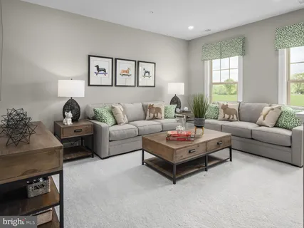 a living room with furniture and a couch