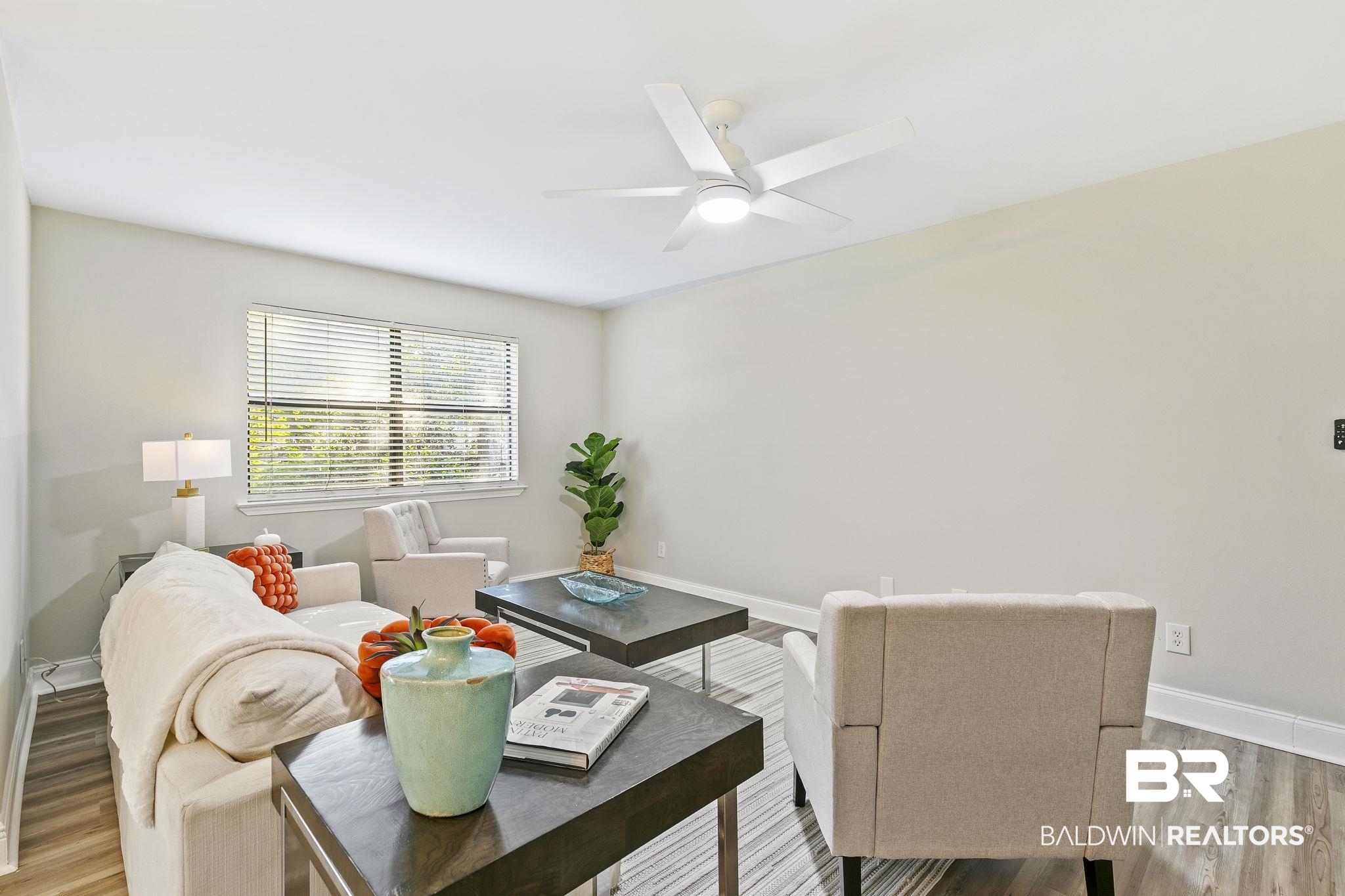 110 5th Street, Unit C103 Daphne, AL 36526 - Photo 8 of 46 Living room featuring hardwood / wood-style flooring and ceiling fan