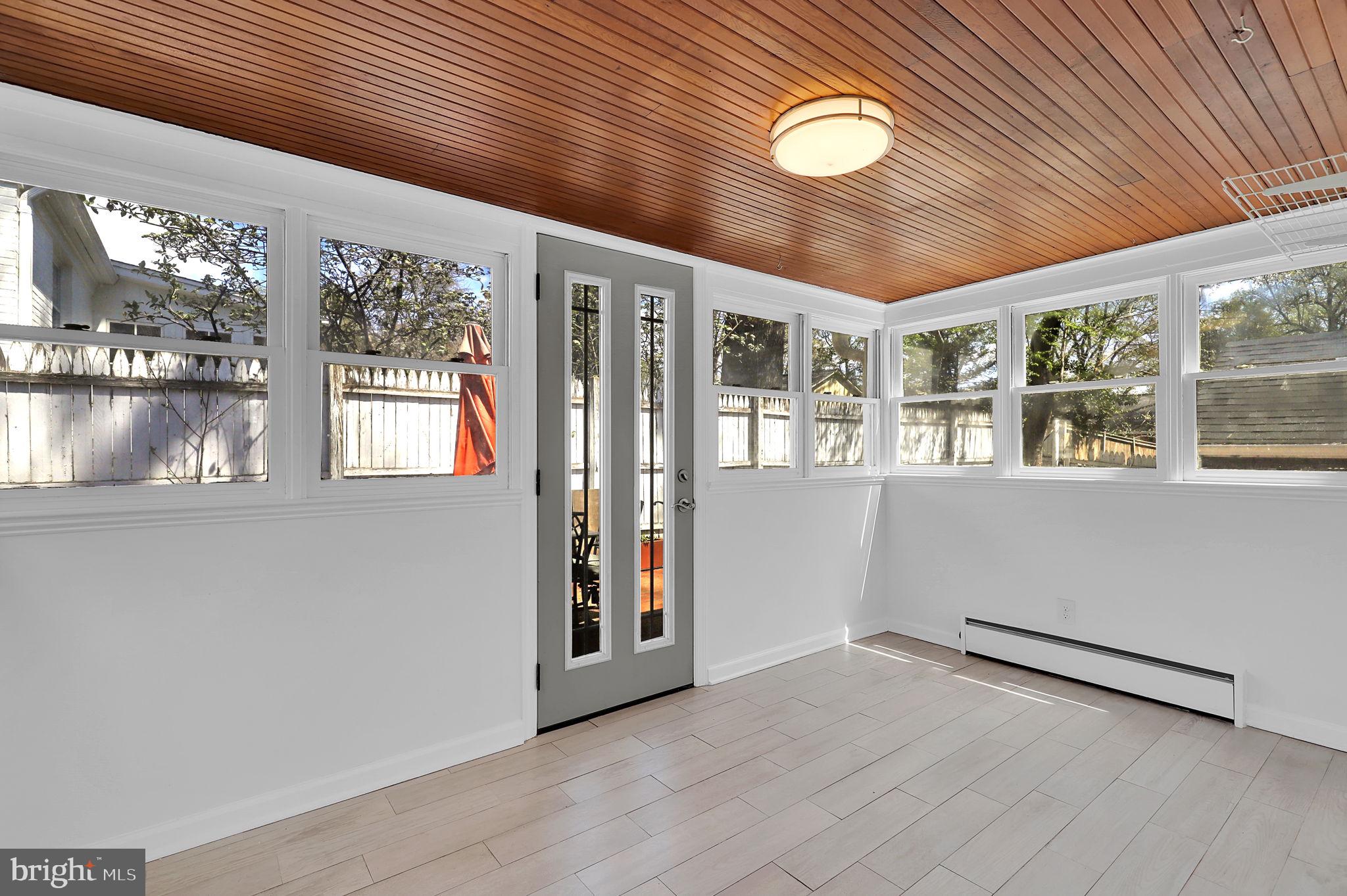 1009 Stirling Road Silver Spring, MD 20901 - Photo 11 of 33 a view of an empty room with a window