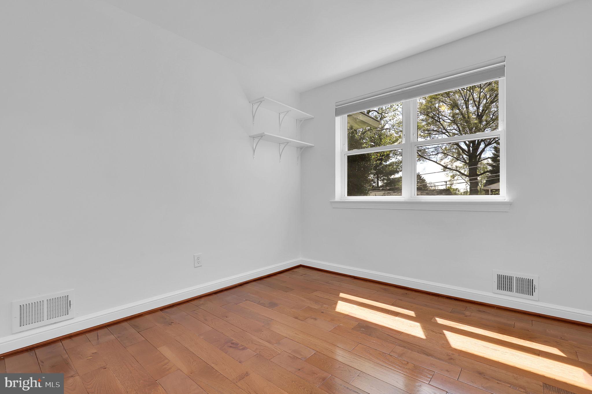 1009 Stirling Road Silver Spring, MD 20901 - Photo 15 of 33 a view of empty room with window