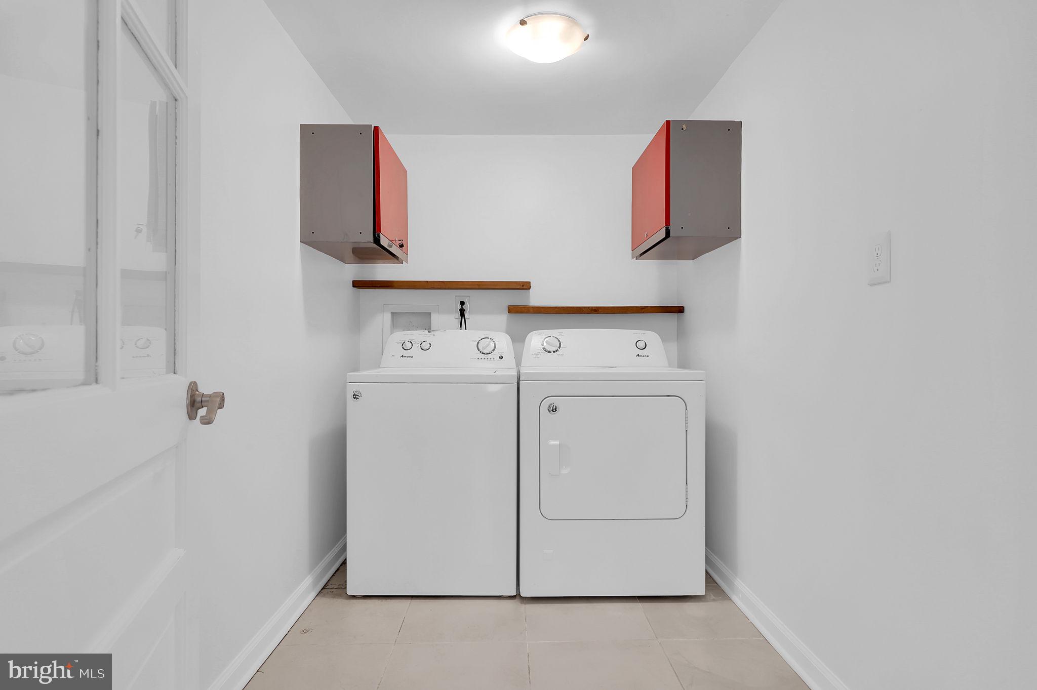 1009 Stirling Road Silver Spring, MD 20901 - Photo 24 of 33 a utility room with dryer and washer