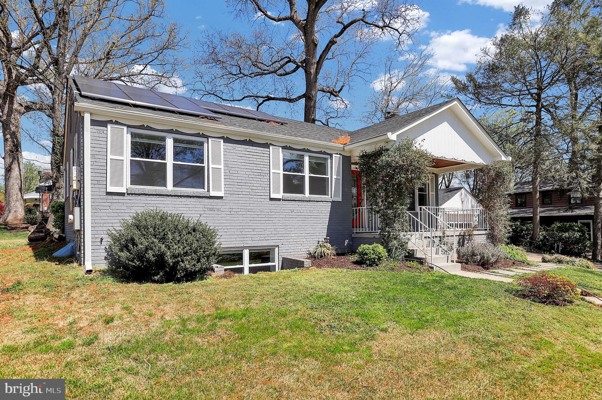 1009 Stirling Road Silver Spring, MD 20901 - Photo 27 of 33 a front view of a house with garden