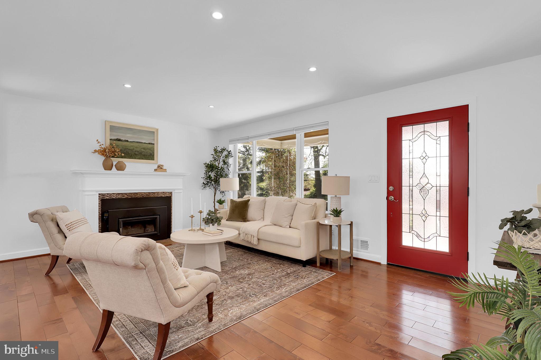 1009 Stirling Road Silver Spring, MD 20901 - Photo 4 of 33 a living room with furniture and a fireplace