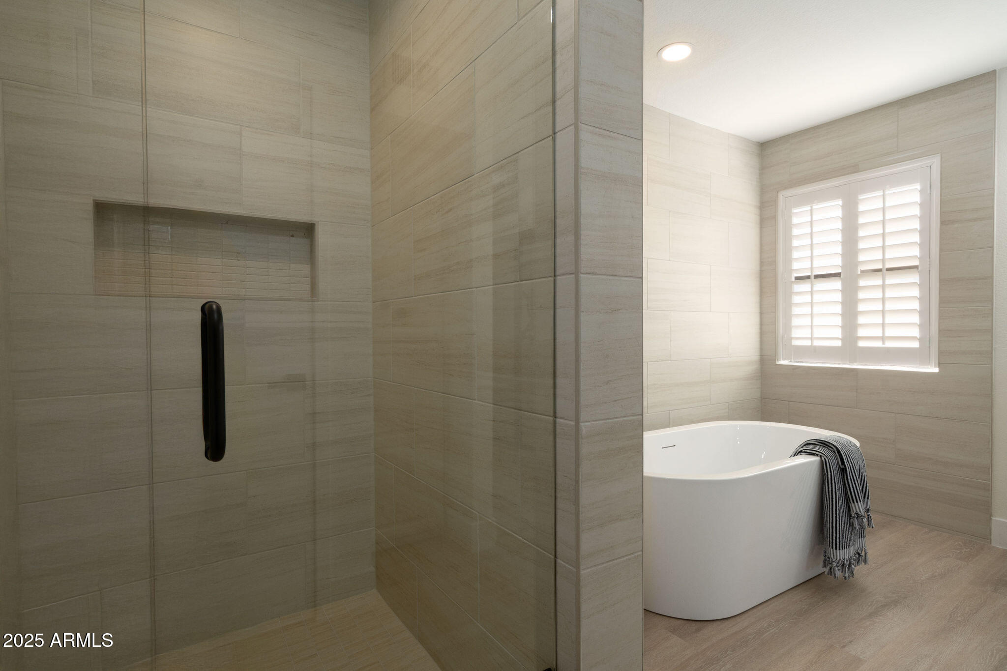 120 West Thunderbird Road Phoenix, AZ 85023 - Photo 19 of 26 a bathroom with a shower a bathtub