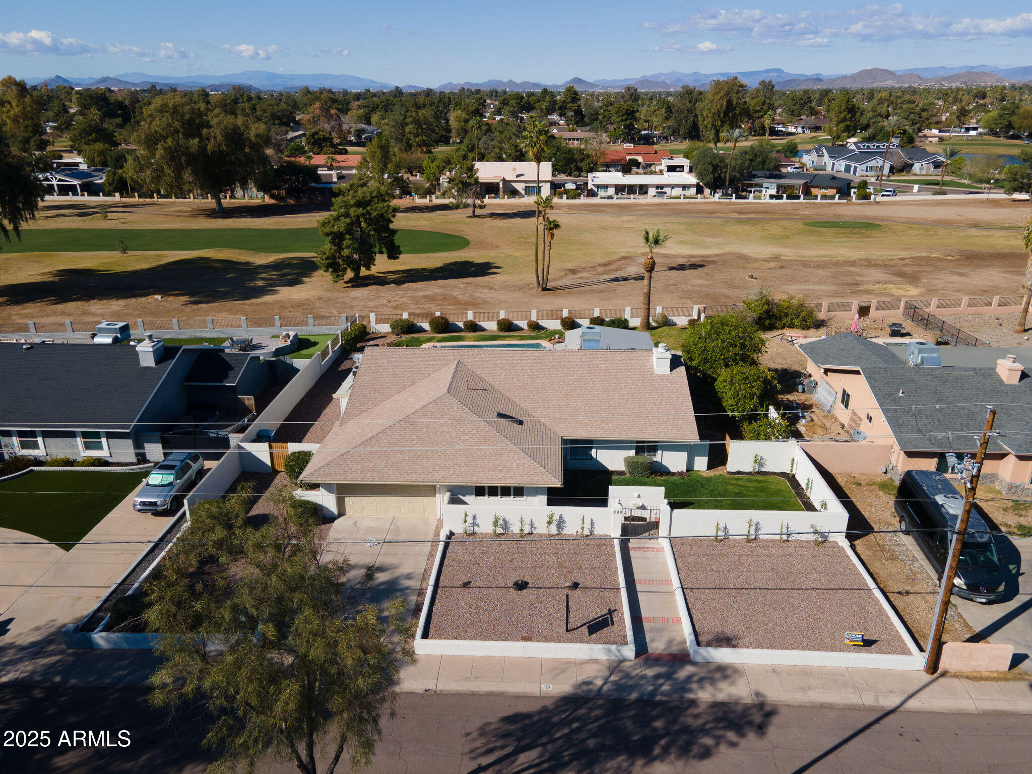 120 West Thunderbird Road Phoenix, AZ 85023 - Photo 2 of 26 an aerial view of residential houses with outdoor space and swimming pool