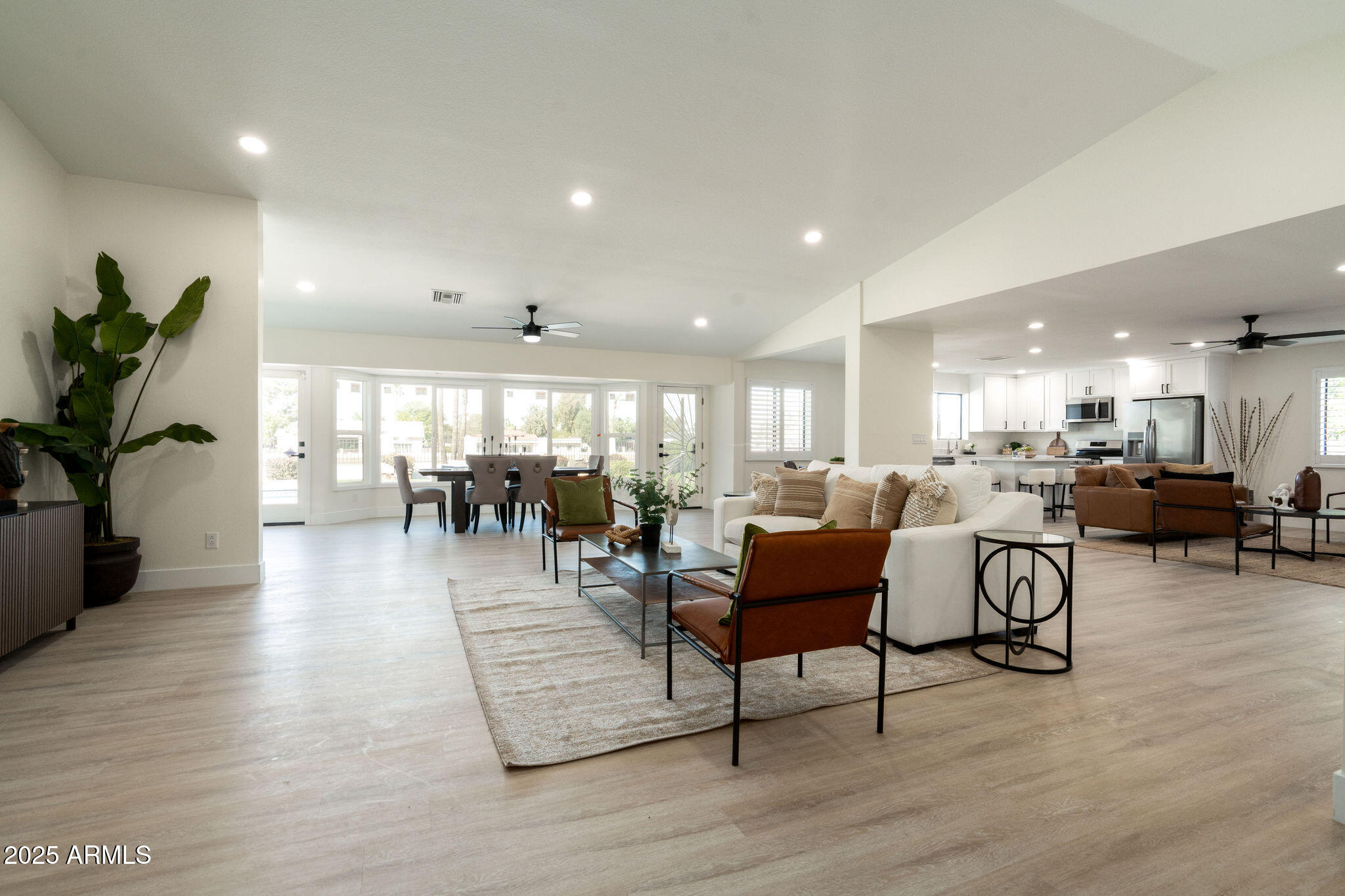 120 West Thunderbird Road Phoenix, AZ 85023 - Photo 5 of 26 a living room with furniture and wooden floor