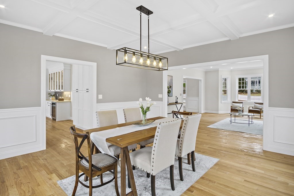 41 Peach Orchard Road Burlington, MA 01803 - Photo 11 of 42 a view of a dining room with furniture window and wooden floor