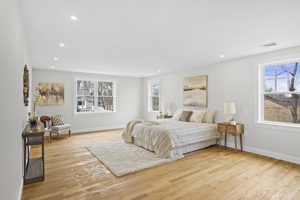 41 Peach Orchard Road Burlington, MA 01803 - Photo 28 of 42 a bedroom with double bed and a window