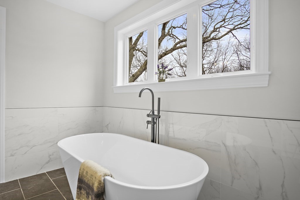 41 Peach Orchard Road Burlington, MA 01803 - Photo 33 of 42 a bathroom with a white sink and a window