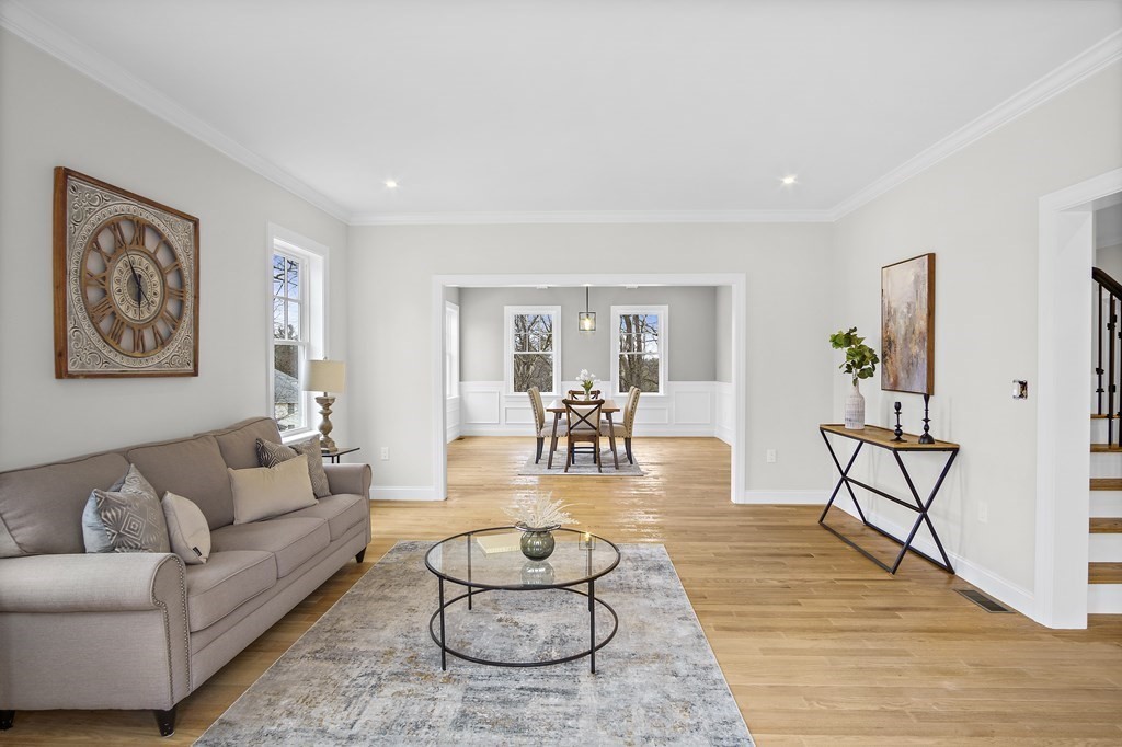 41 Peach Orchard Road Burlington, MA 01803 - Photo 7 of 42 a living room with furniture and wooden floor