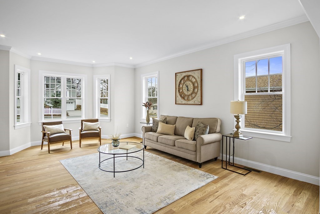 41 Peach Orchard Road Burlington, MA 01803 - Photo 9 of 42 a living room with furniture a rug and a window