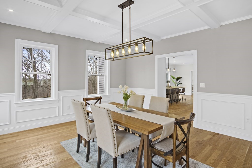 41 Peach Orchard Road Burlington, MA 01803 - Photo 10 of 42 a view of a dining room with furniture window and wooden floor