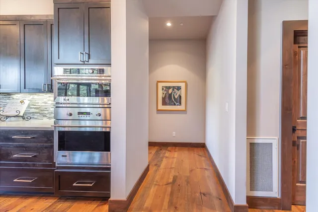 a view of kitchen with wooden floor