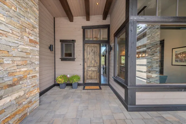 a view of entryway with brick walls