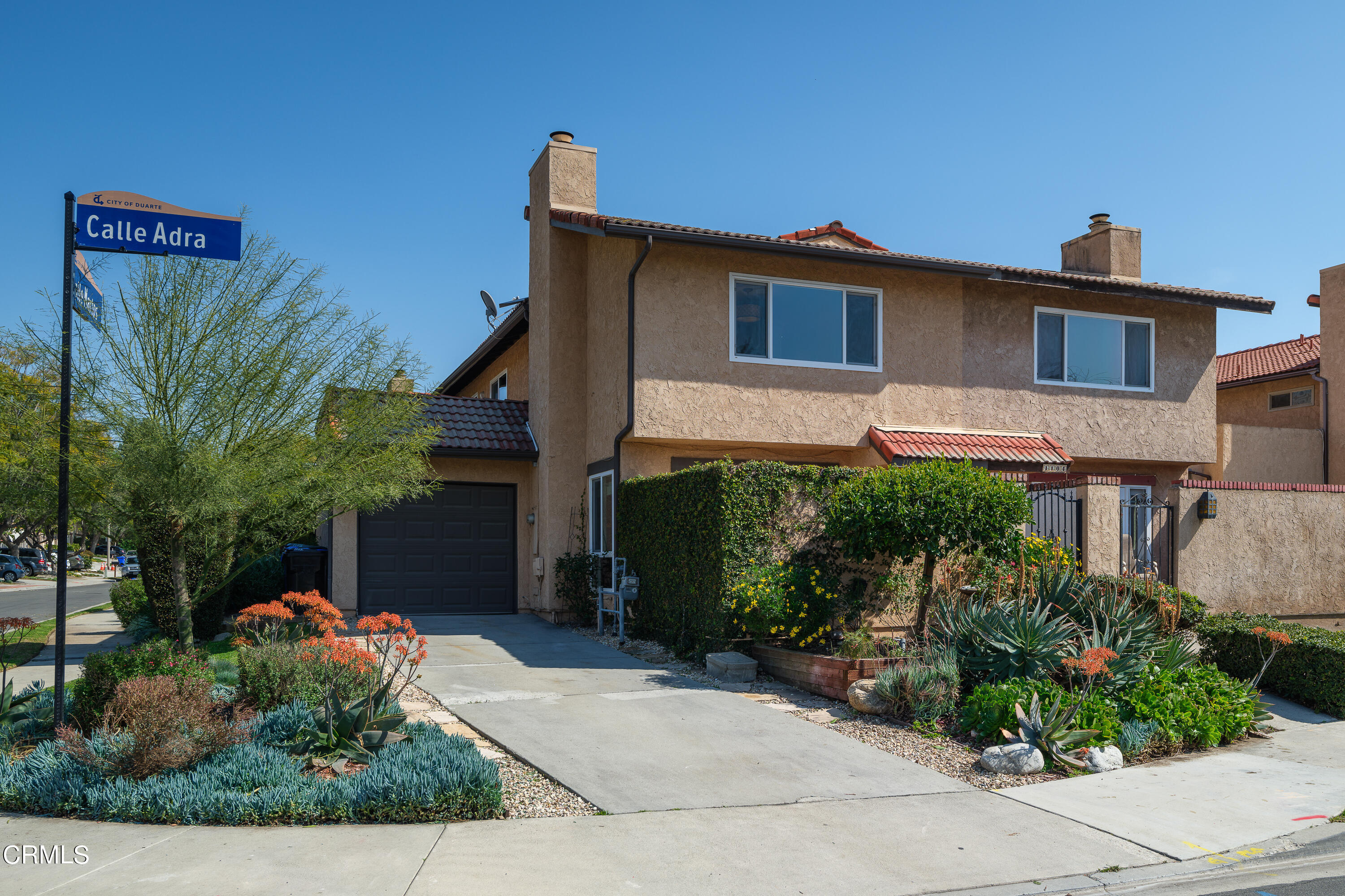 1102 Cll Adra Duarte, CA 91010 - Photo 2 of 37 a front view of a house with garden