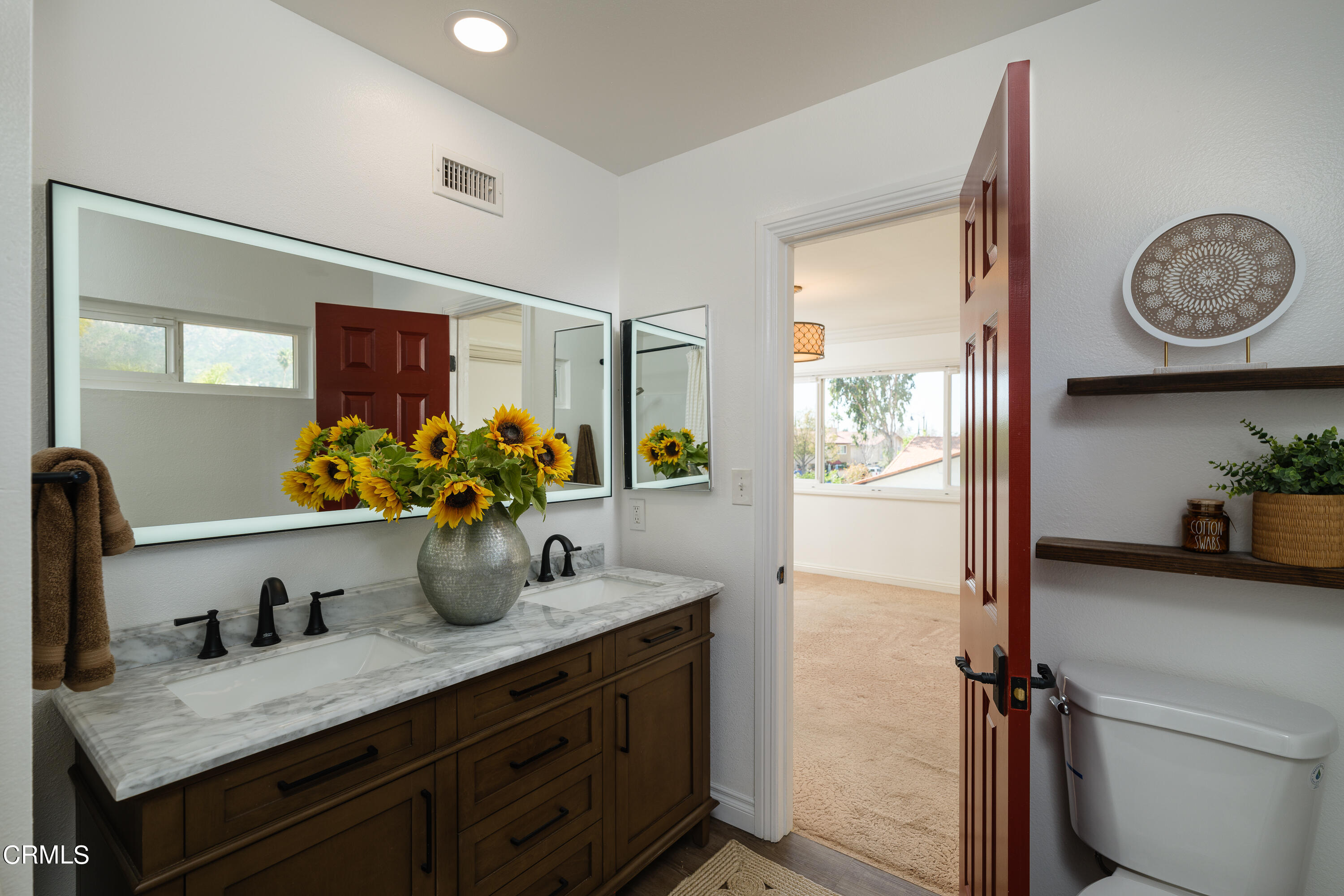 1102 Cll Adra Duarte, CA 91010 - Photo 33 of 37 a bathroom with a granite countertop sink and a mirror