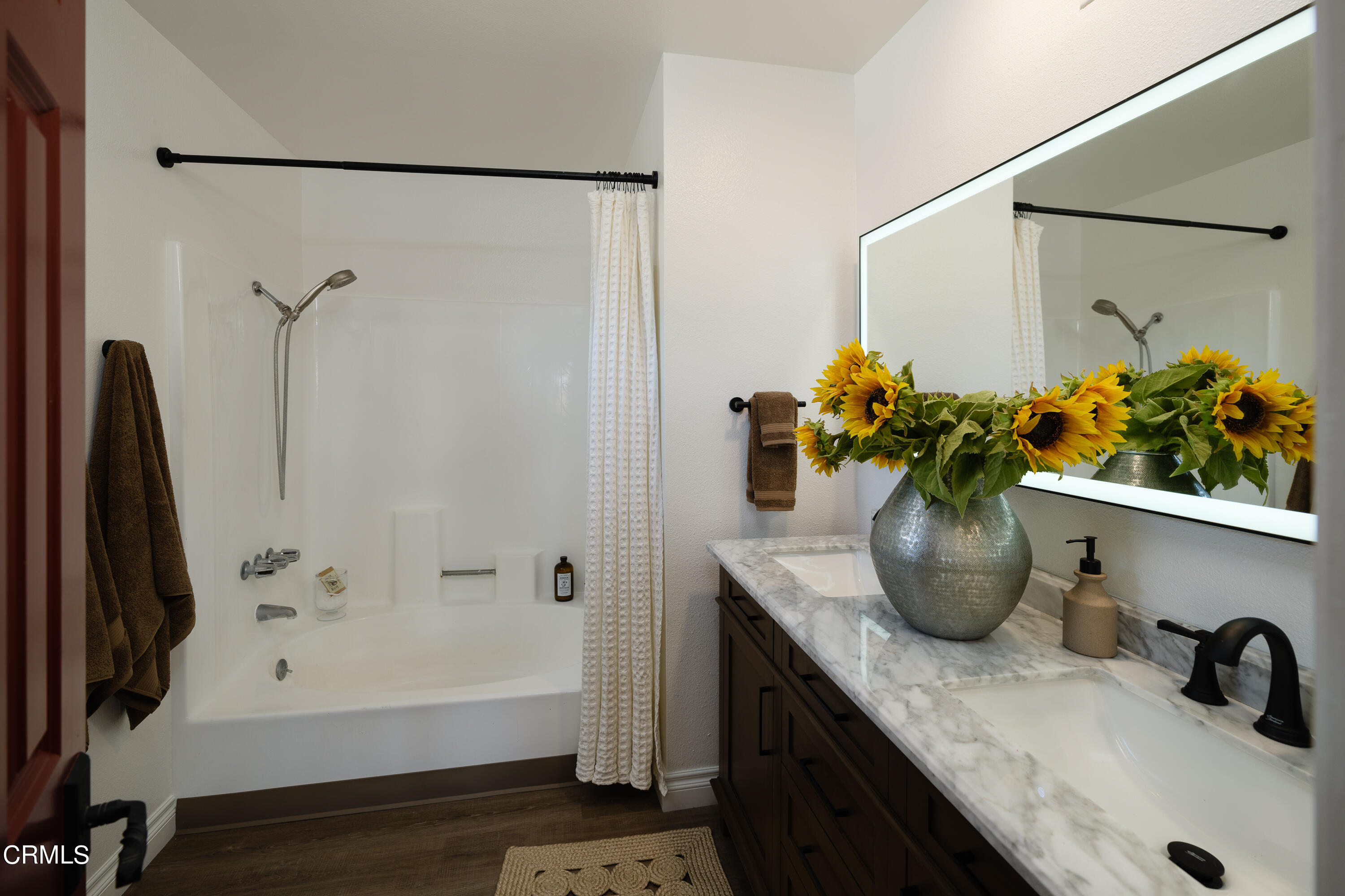 1102 Cll Adra Duarte, CA 91010 - Photo 34 of 37 a bathroom with a tub sink and mirror