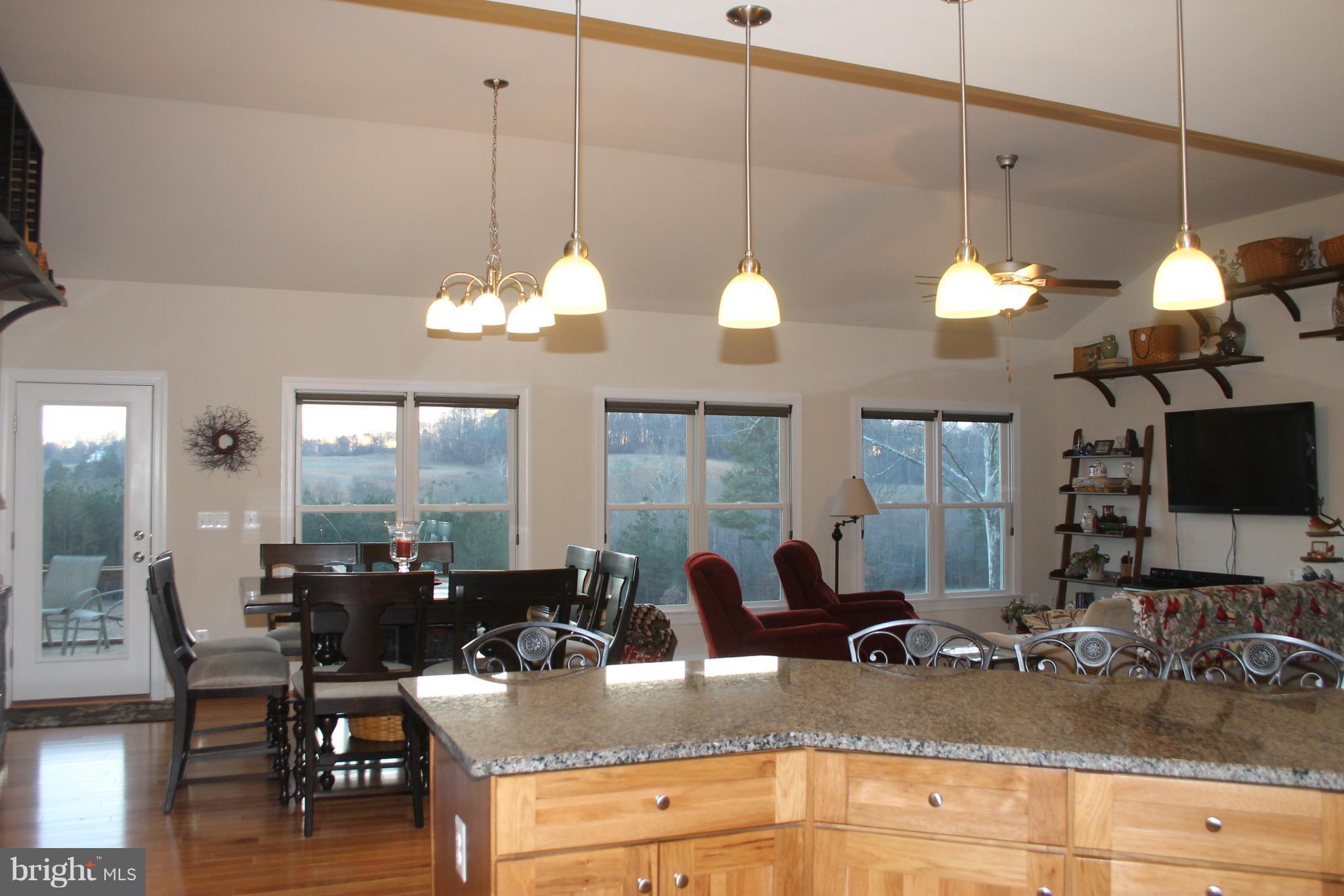 17372 Crookes Farm Road Rixeyville, VA 22737 - Photo 16 of 30 Kitchen view, Wall of windows in Great room