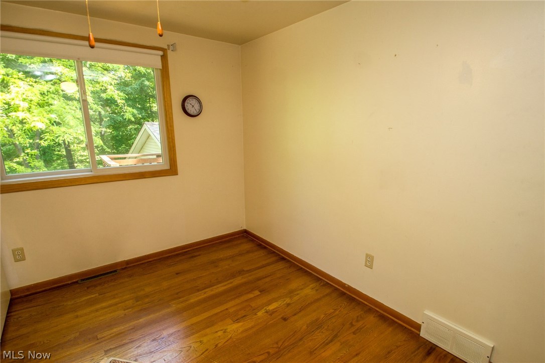 8107 Stone Road Independence, OH 44131 - Photo 19 of 29 Bedroom 3 with hardwood floor