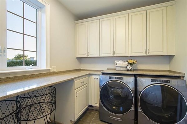 23 Pope Road Atkinson, NH 03811 - Photo 19 of 40 a utility room with sink dryer and washer