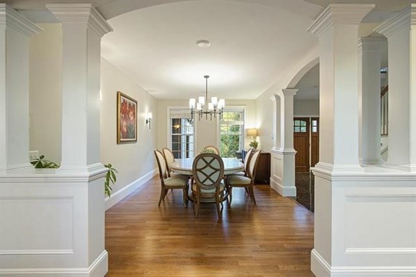 23 Pope Road Atkinson, NH 03811 - Photo 10 of 40 a dining room with furniture a chandelier and wooden floor